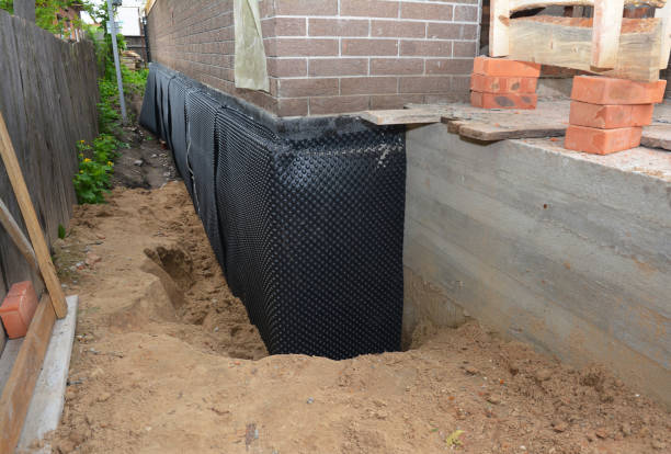 Happy homeowners after waterproofing job in Sylacauga